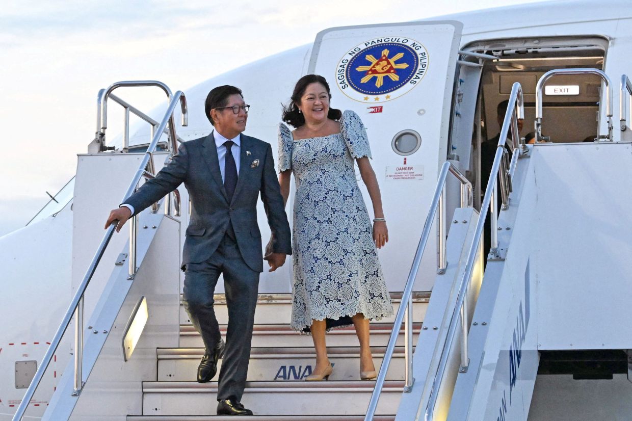 Philippine President Ferdinand Marcos Jr. and his wife Liza Araneta Marcos arrive at Haneda International Airport in Tokyo, Japan, on Tuesday, May 26, 2026, in this photo released by Kyodo. Photo: Kyodo via REUTERS 