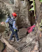 Search continues for seven villagers trapped in flooded Laos cave