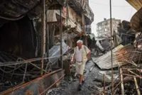 War-weary Kyiv residents defiant over Russian threat of new strikes