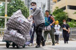 Hong Kong banks replace burnt cash from residents of fire-ravaged Wang Fuk Court
