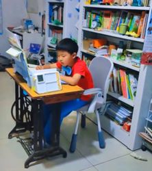 China mum makes son pedal sewing machine during homework to stay focused, sparks debate