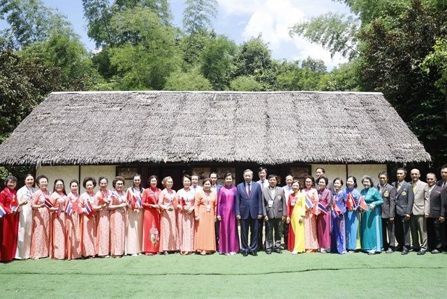 Party General Secretary and President Lam, his spouse, and delegates at the Ho Chi Minh Memorial Site.