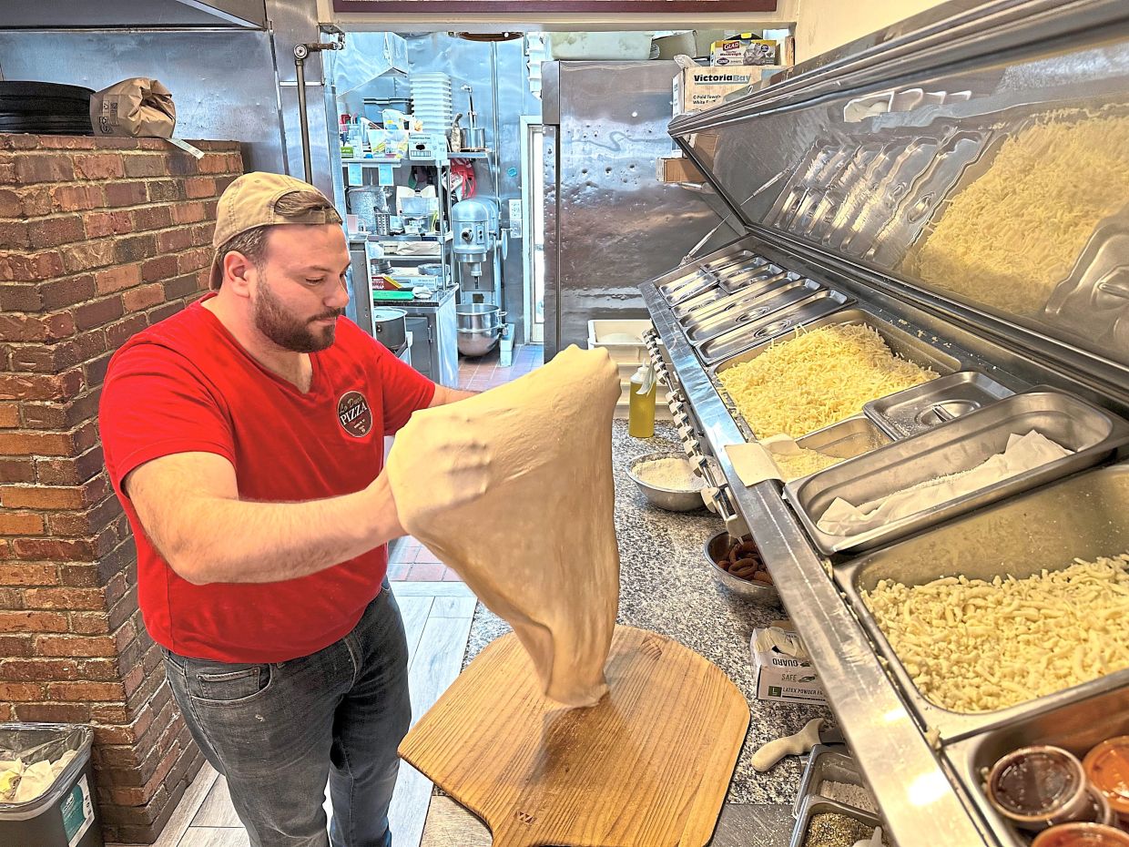 Salvatore Lo Duca makes pizza at Lo Duca Pizza in the Brooklyn borough of New York.