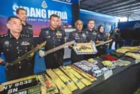 Two robbery suspects shot