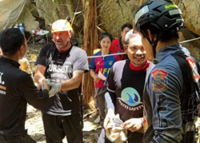 Diver says 'racing against time' to rescue seven trapped for a week in Laos cave