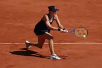 Tennis-Bencic powers past McNally into third round of French Open