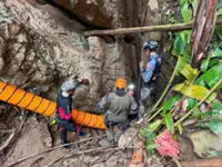 Rescue teams find five trapped in Laos cave, search for two more continues