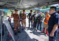 Search for missing hiker at Gunung Batu Putih suspended, team camps overnight
