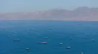Iran could open Strait of Hormuz within a month if terms agreed, state TV says