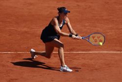 Tennis-Bencic powers past McNally into third round of French Open