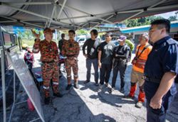 Search for missing hiker at Gunung Batu Putih suspended, team camps overnight