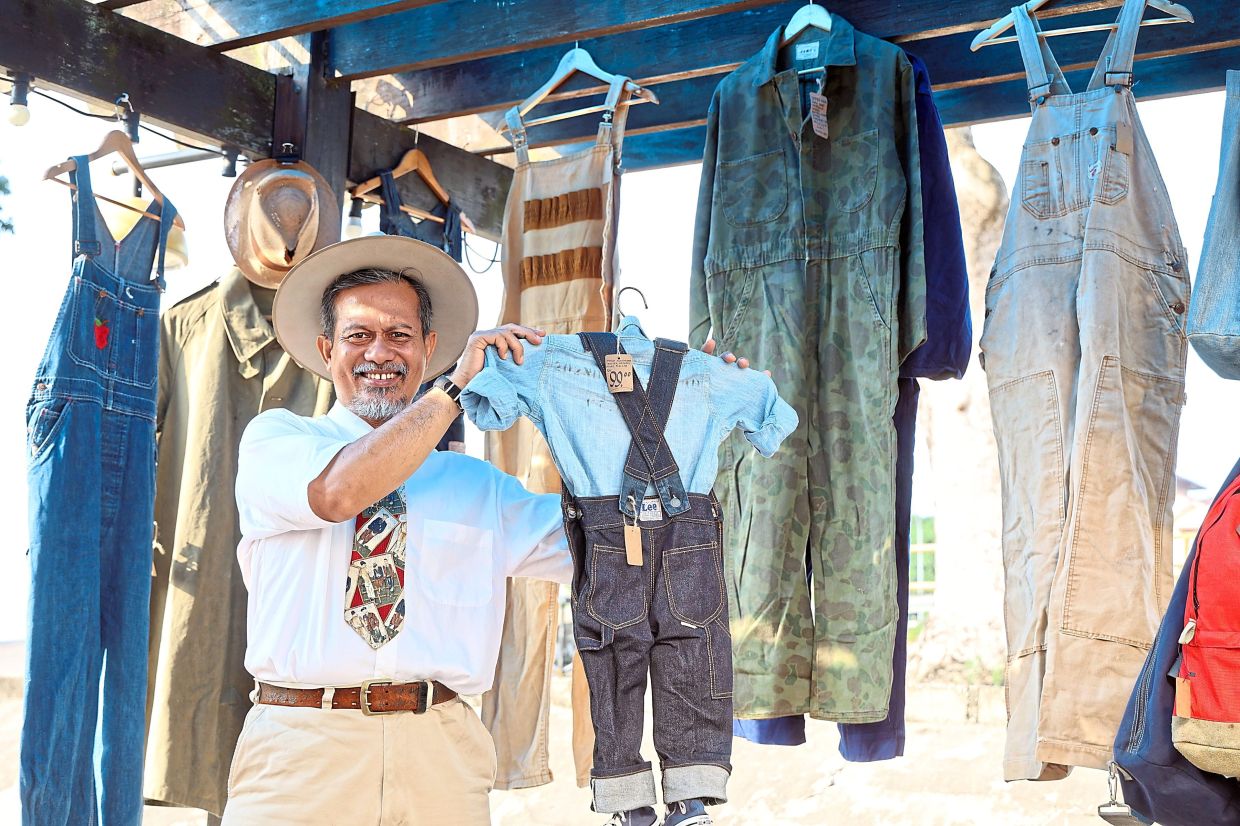 Anuar with some of the vintage clothing at his stall at the flea market in Angsana Mall Johor Baru.