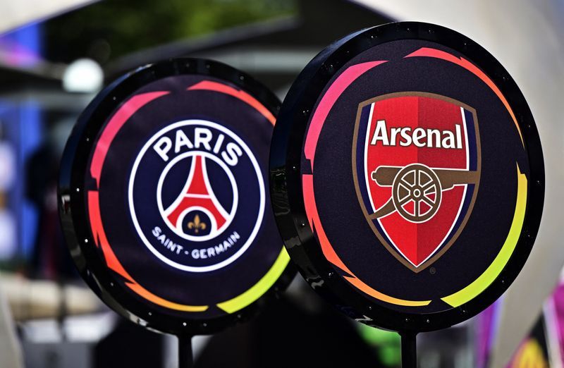 Soccer-Arsenal one win from history as PSG stand in their way