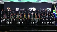 Soccer-South Africa name two uncapped players in World Cup squad