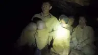 Rescuers in Laos say more oxygen needed to save 7 divers trapped in cave