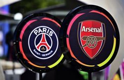 Soccer-Arsenal one win from history as PSG stand in their way