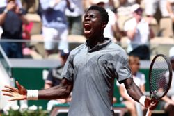 Tennis-French teen Kouame reaches French Open third round in five-set thriller