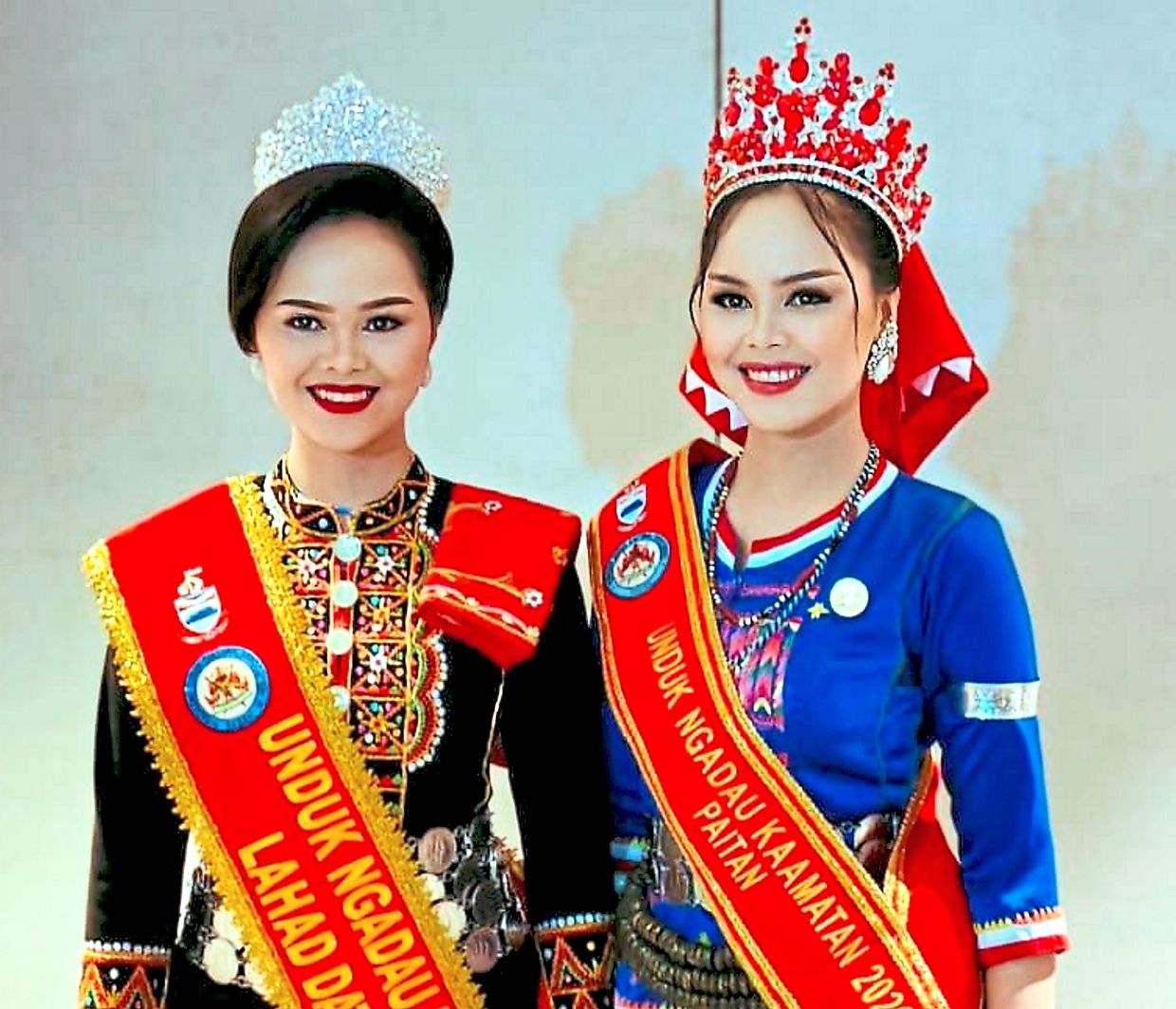 The 25-year-old twin contenders have impressed the judges and crowd with their fluency in the Dusun language.
