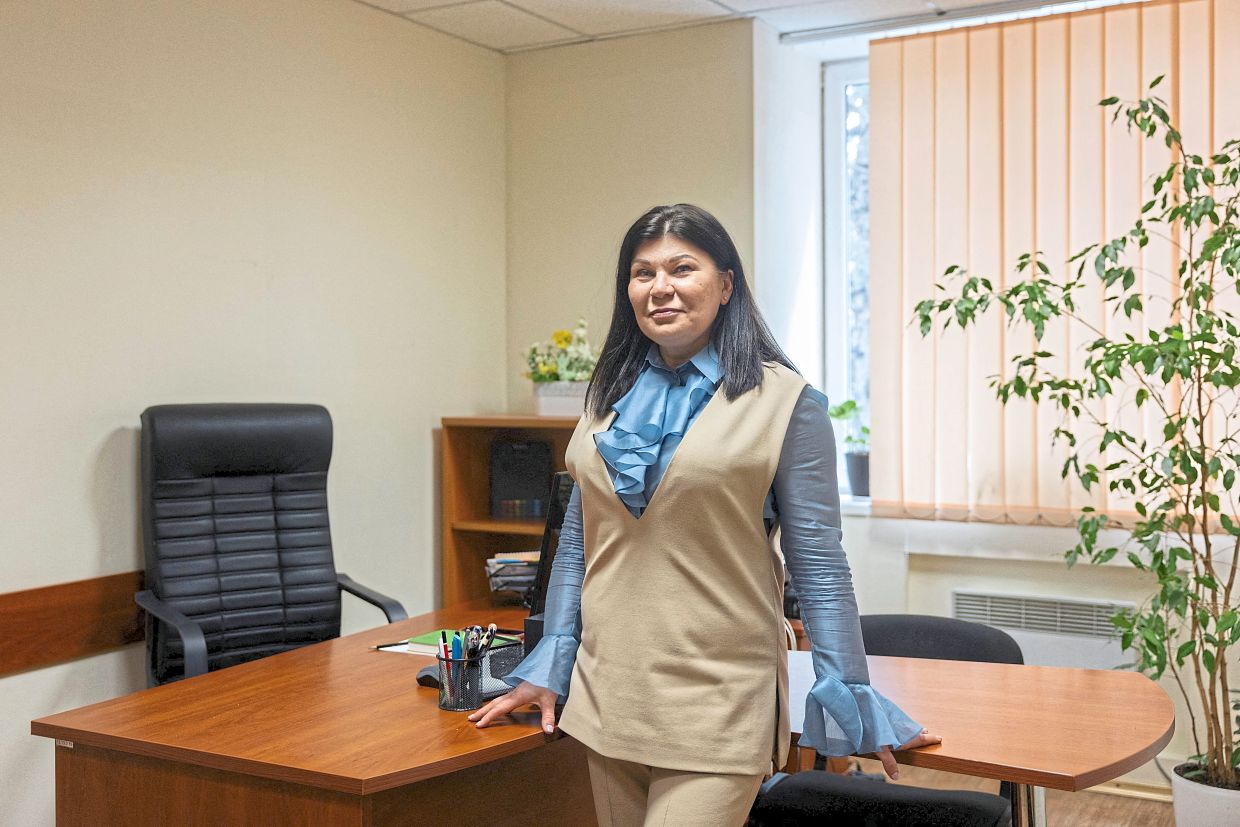 Biosphere’s Shpitz posing for a photo in her office in Dnipro amid the Russian invasion of Ukraine. — AFP