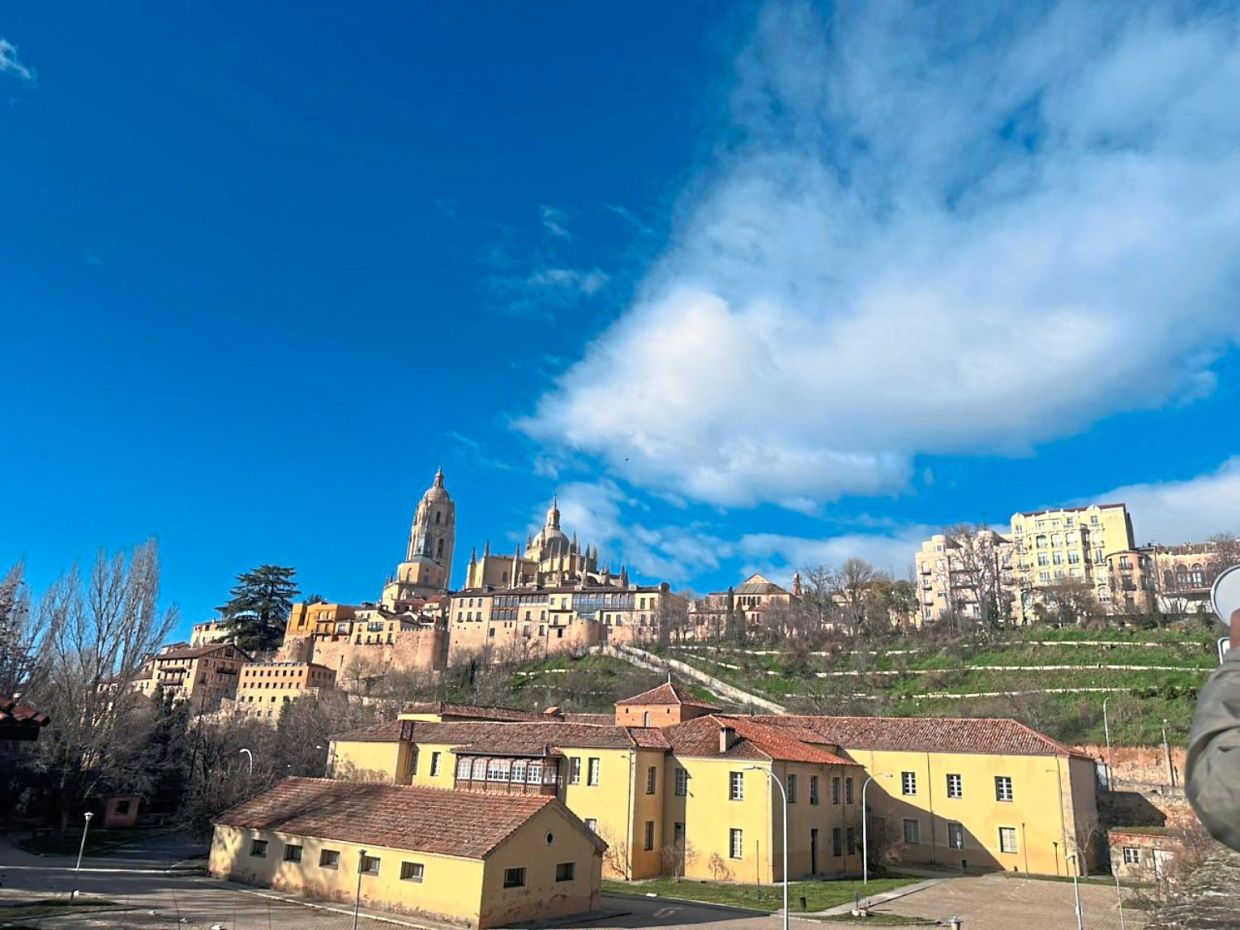 The Alcazar of Segovia sits atop a hill.