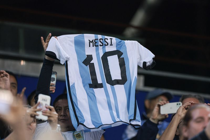 The main shopping streets of Buenos Aires are flooded with hats, flags, mate ​gourds and t-shirts in patriotic light-blue and ⁠white colors.