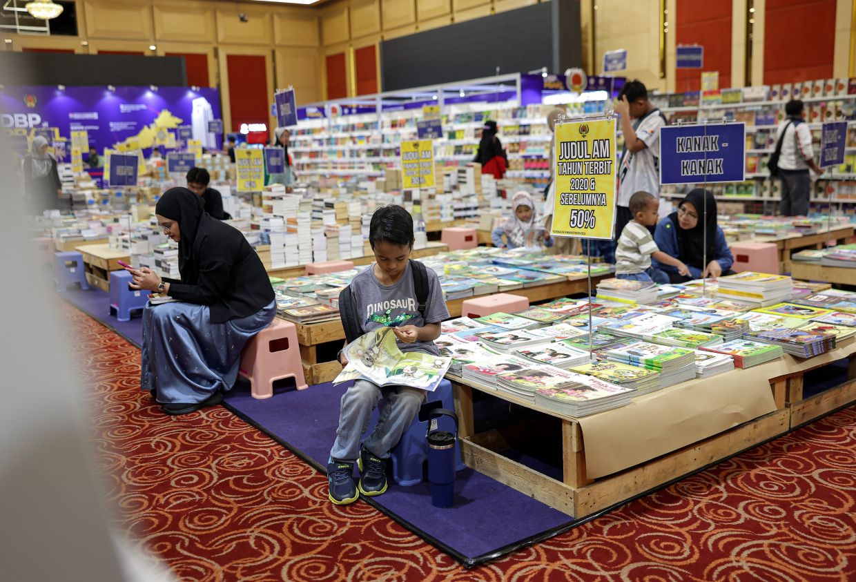 A Children’s Literature Festival aims to nurture reading habits through art activities, colouring contests, drawing classes and costume performances. Photo: Bernama