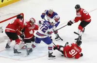 Ice hockey-Canada through to world championship semis after win over US