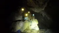 Rescuers in Laos say more oxygen needed to save seven people trapped in cave