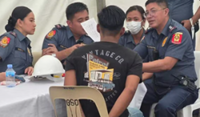 Man in custody for faking survival in Philippine building collapse