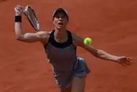 Tennis-Kostyuk beats Golubic to maintain clay form at French Open