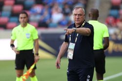 Soccer-Advocaat happy to be back at the helm of an excited Curacao