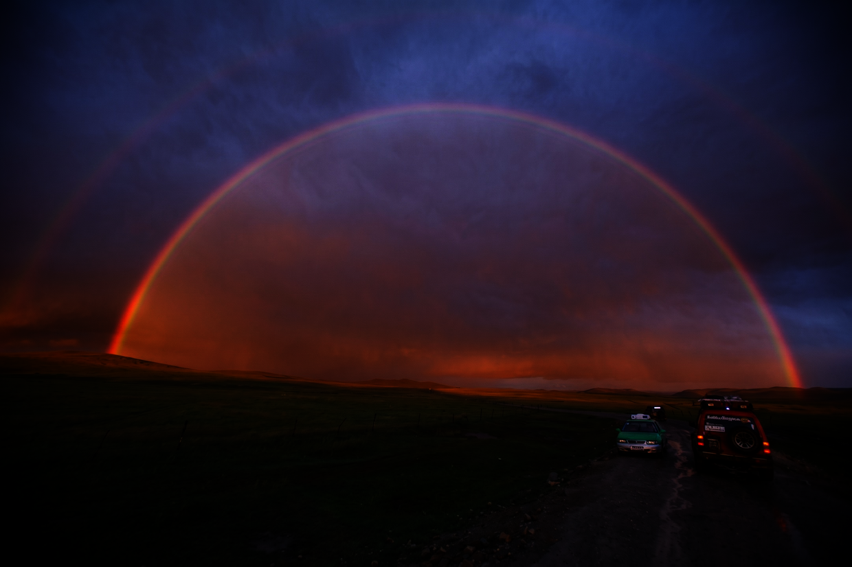 A double rainbow at sunset in the steppes during a past expedition.