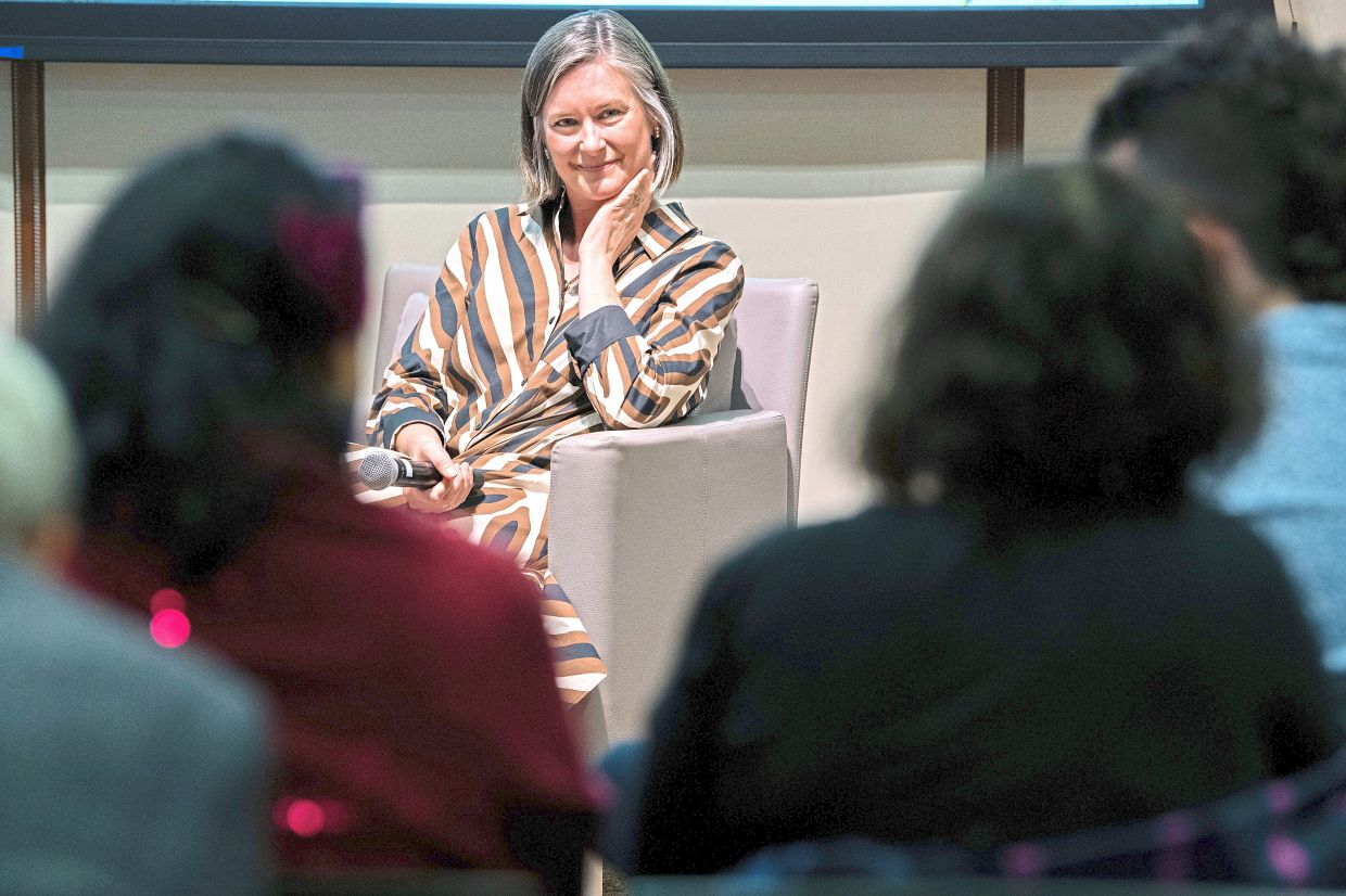 Wilkinson giving a talk about living with climate uncertainty at American University in Washington. 