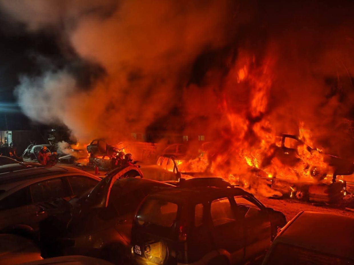 Two factories were destroyed in a fire along Jalan Kampung Baru Sungai Buloh on Saturday (May 30).