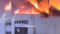 Fire razes George Town's iconic Odeon building