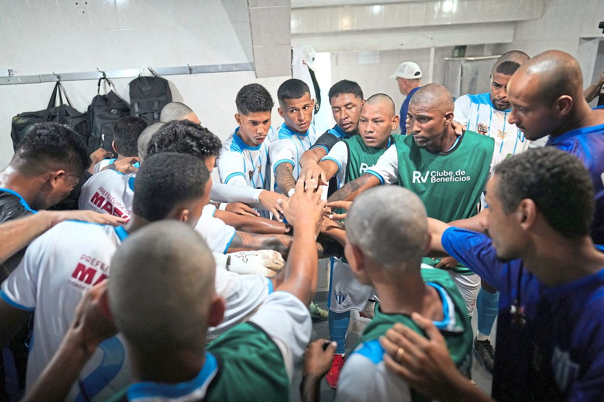 The team gathers in the dressing room before a match.