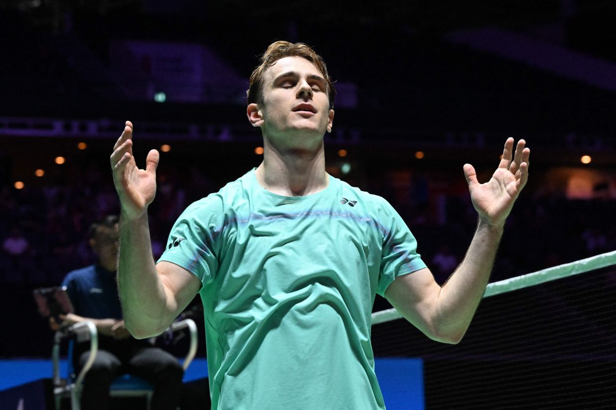Alex Lanier of France celebrates his victory against Loh Kean Yew of Singapore in their men's singles final match of the KFF Singapore Open Badminton tournament in Singapore on Sunday, May 31, 2026. -- Photo by Roslan RAHMAN / AFP