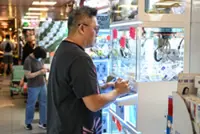 'Totally hooked': Hong Kong targets claw machine addiction