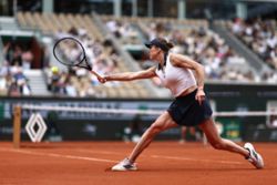 Tennis-Svitolina rallies past Bencic to reach French Open quarter-final