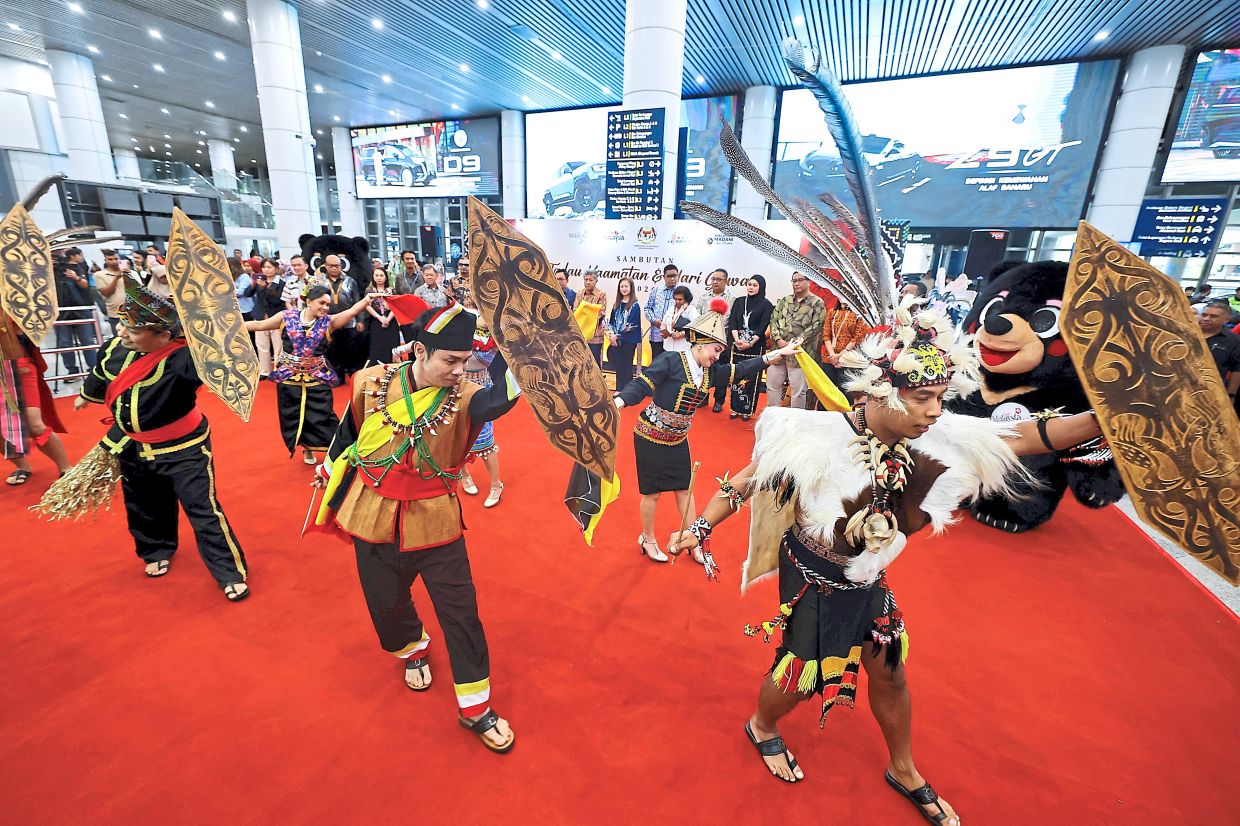 Travellers arriving at Kota Kinabalu International Airport on Saturday, KLIA Terminal 1 yesterday, and Kuching International Airport today were greeted with a taste of East Malaysia’s rich harvest festival traditions.