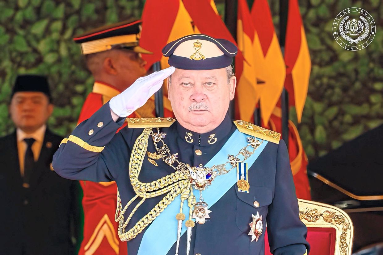 The King arriving for the opening ceremony of the Fifth Session of the 15th Parliament in Kuala Lumpur in January this year.