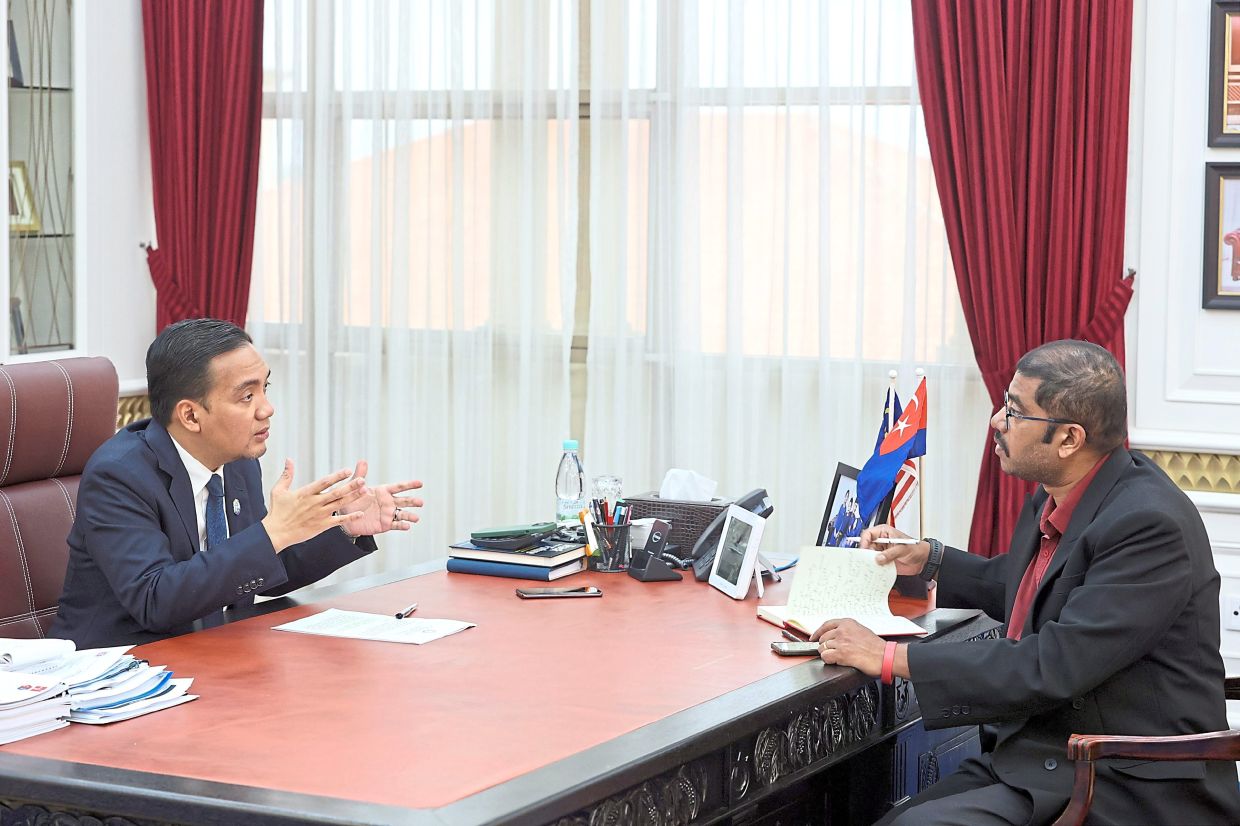 The Mentri Besar chatting with The Star’s senior news editor Nelson Benjamin at his office in Kota Iskandar, Johor Baru.