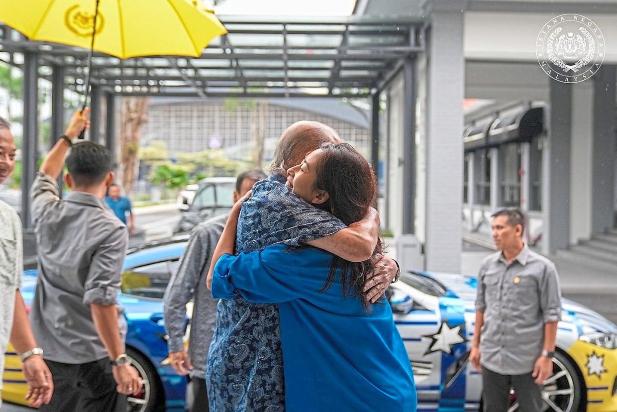 Sultan Ibrahim sharing a warm, emotional embrace with his only daughter after making a special trip to surprise her on her birthday last year. — Photo from Sultan Ibrahim Sultan Iskandar’s Facebook page