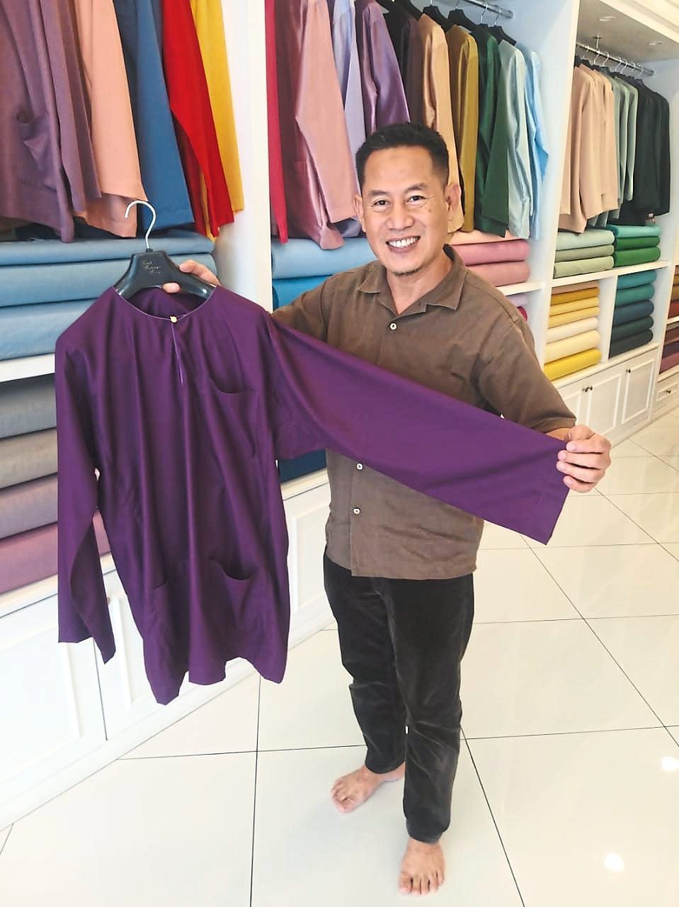 Jamil showing a baju Melayu Teluk Belanga top. — Photo by ZAZALI MUSA/The Star 