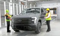 AI rally drives Ford to best month since crisis