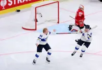 Ice hockey-Helenius is the hero as Finland beat Swiss in world final