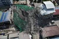 Death toll rises to 12 in under-construction building collapse in Philippines
