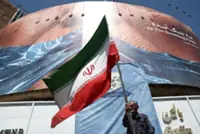 US says it struck Iranian military sites, Tehran responds with air base attack