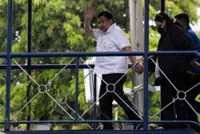 Philippine senator Estrada surrenders over graft case