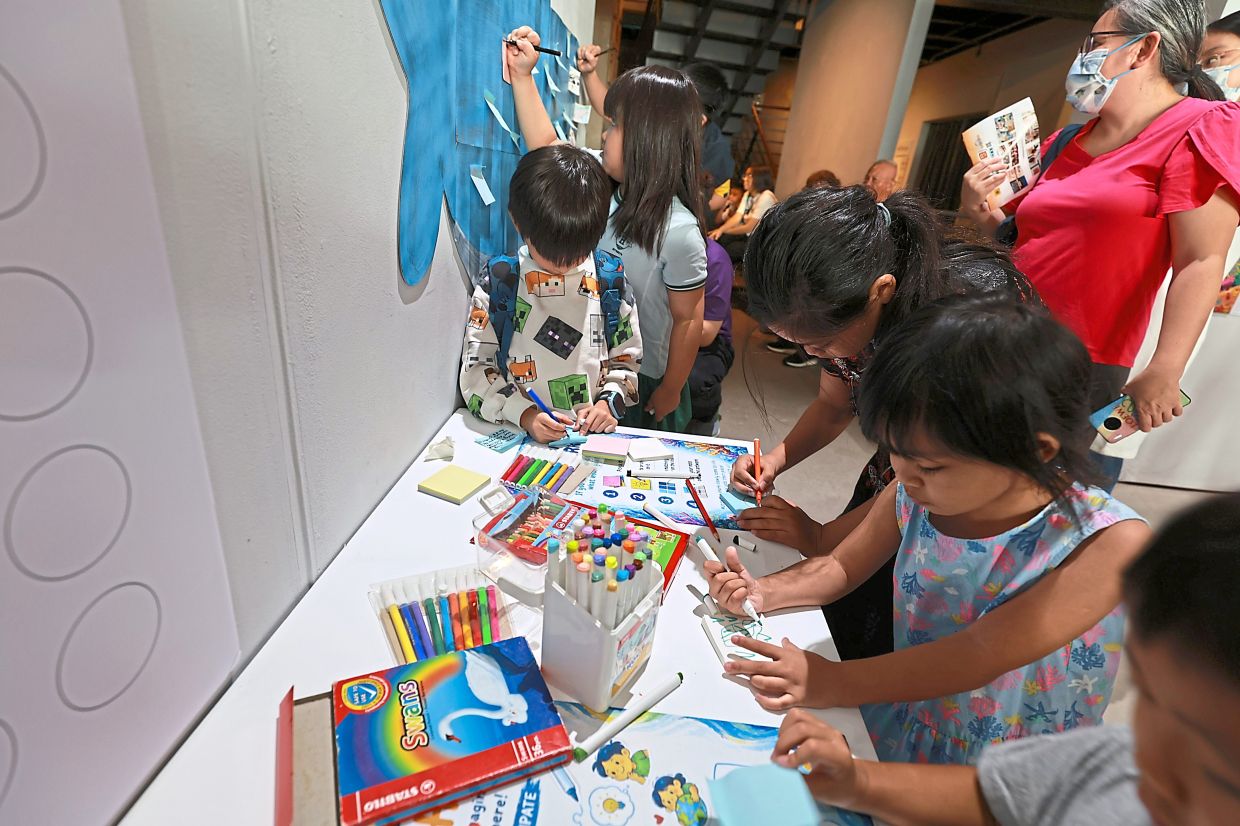 Children taking part in the activities at the exhibition in Kuala Lumpur.